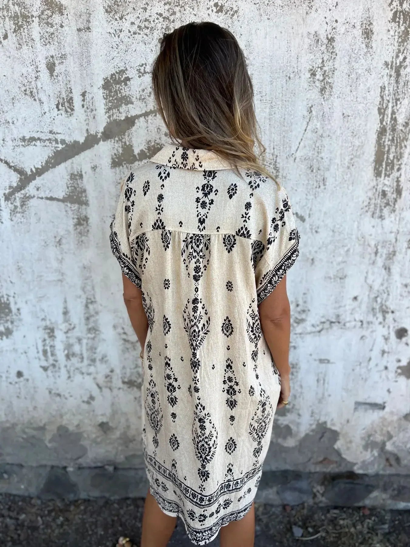 Zomer losse damesjurk met korte mouwen, knopen, mode, bedrukte zak, casual straatstrandshirt, midi-rok