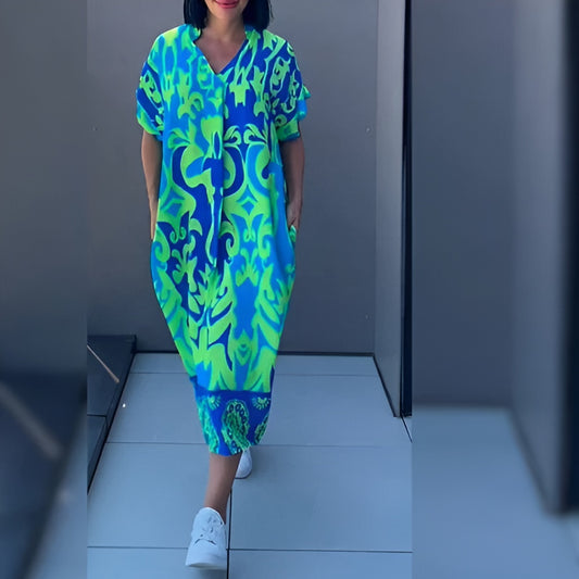 Elena™ - Elegantti kukkamekko